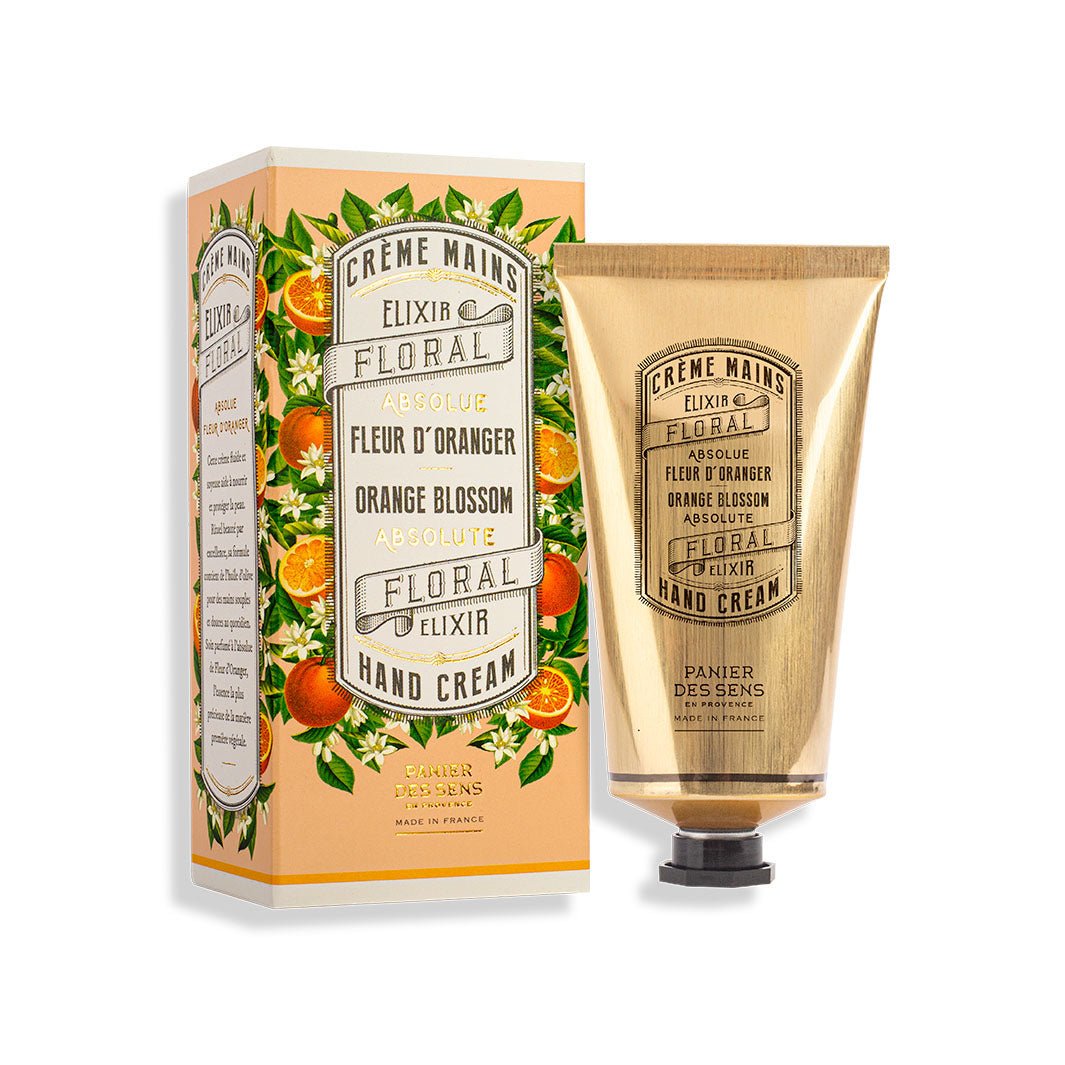 Produktbild: Handcreme in gold neben Verpackung Fleur d'Oranger